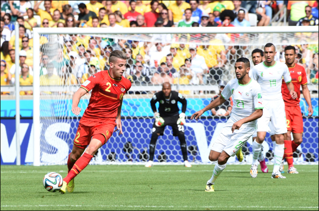 Riyad Mahrez in action for Algeria at the 2014 World Cup vs Belgium